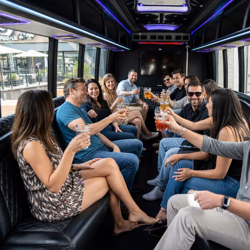 Group boarding a white charter bus for Winery & Brewery Tour Transportation transportation in New Orleans