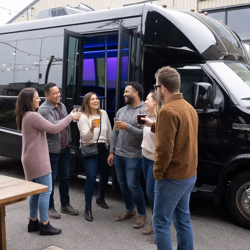 Passengers loading luggage while boarding an New Orleans group shuttle